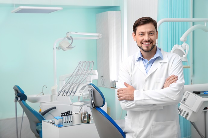 Dentist in exam room